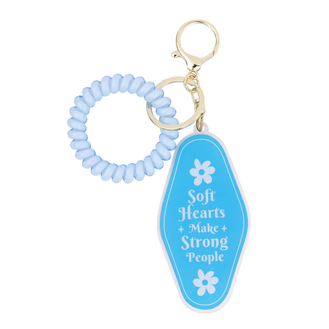 soft hearts make strong people keychain, motivational keychain accessory, calm era fashion accessory, keychain under $5, gender-inclusive keychain with heartfelt message