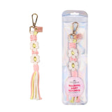 Pink Daisy Macrame Keychain wholesale, pink floral keychain bulk pricing, boutique keychains wholesale, floral themes party favors wholesale, supplier of bulk pink flower macrame keychains